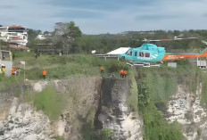 Terjebak di Tebing Pecatu, Dua Turis Rusia Diselamatkan Tim SAR Lewat Udara